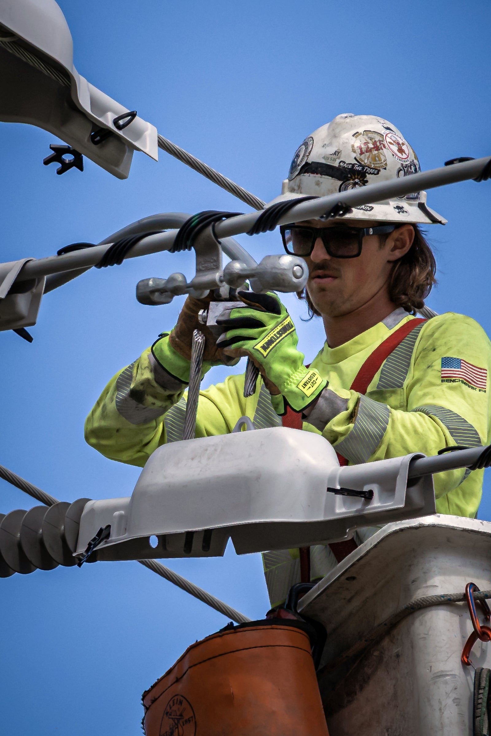 Utility lineman wearing Youngstown gloves